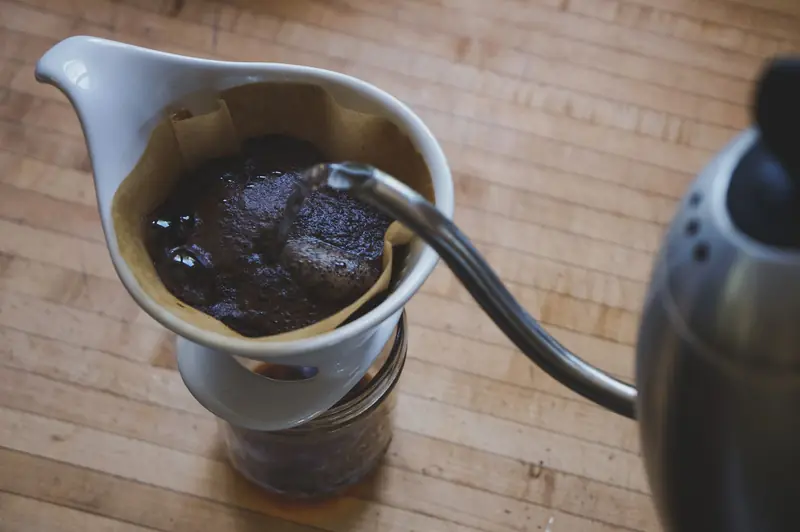 Close-up of freshly brewed pour over coffee on a wooden countertop